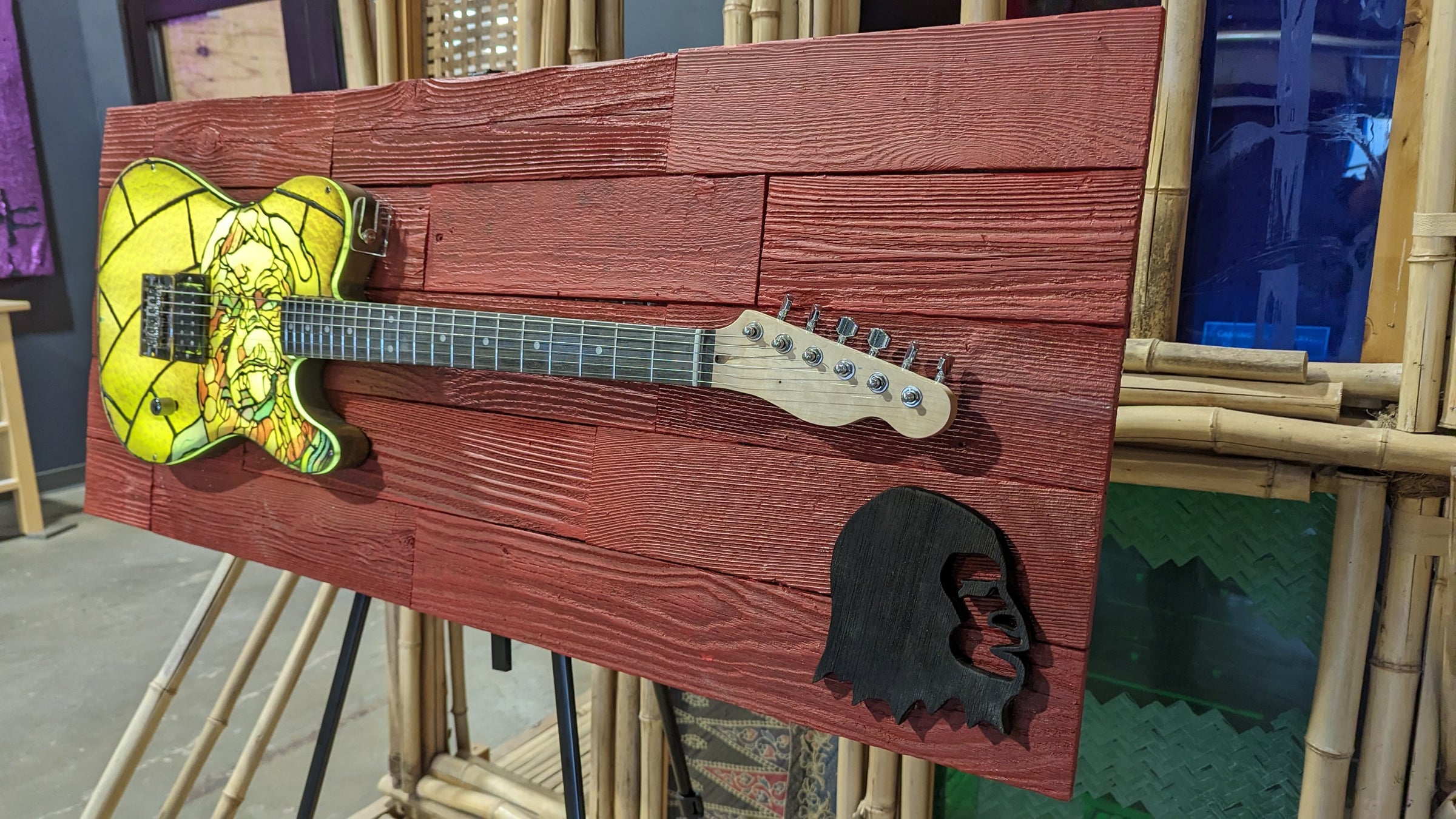 Dr. Zaius Lighted Stained Glass Guitar Art on Red Stained